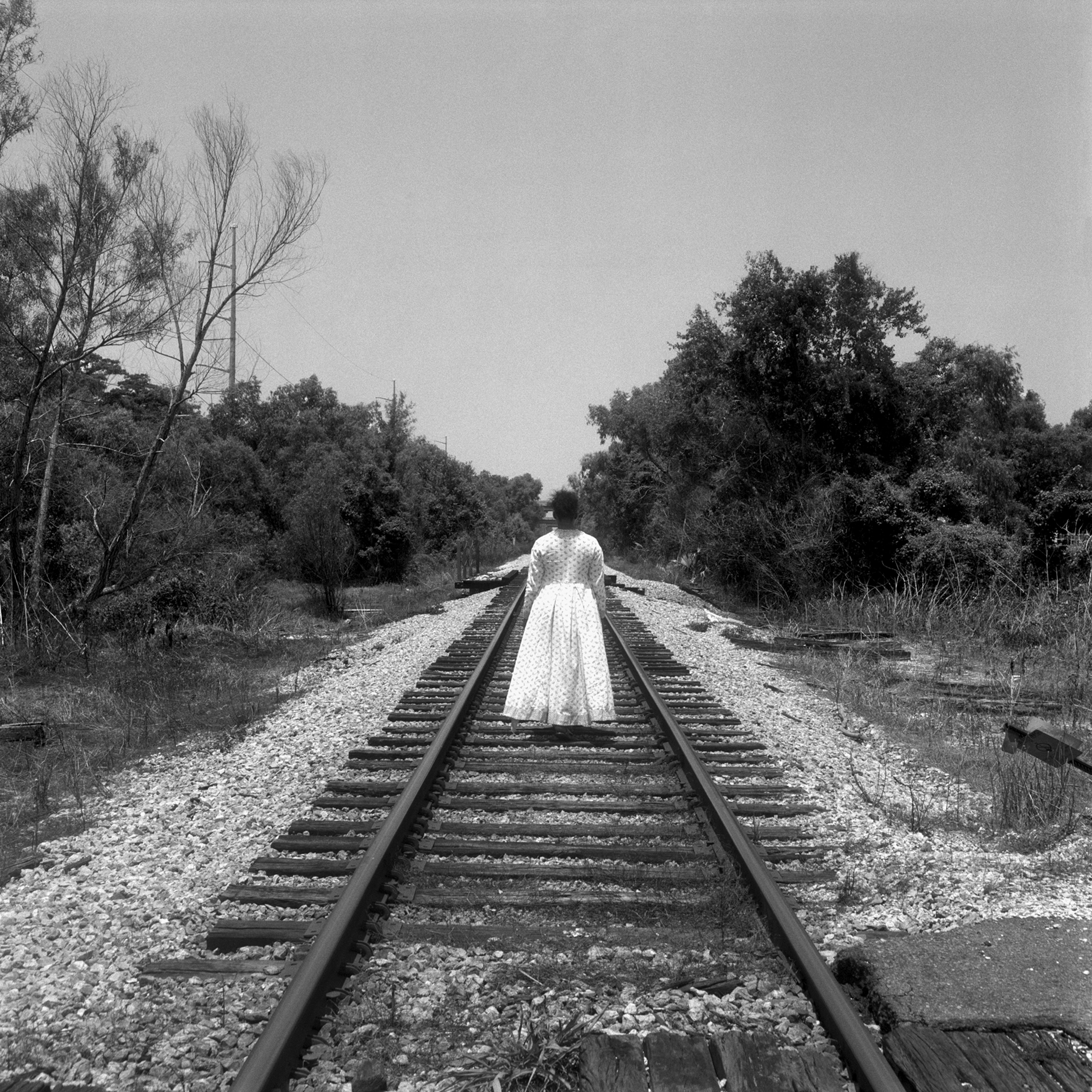Galerie Barbara Thumm \ Carrie Mae Weems, María Magdalena Campos-Pons – Black Matters group exhibition \ Untitled (Woman walking along railroad tracks) (2003)